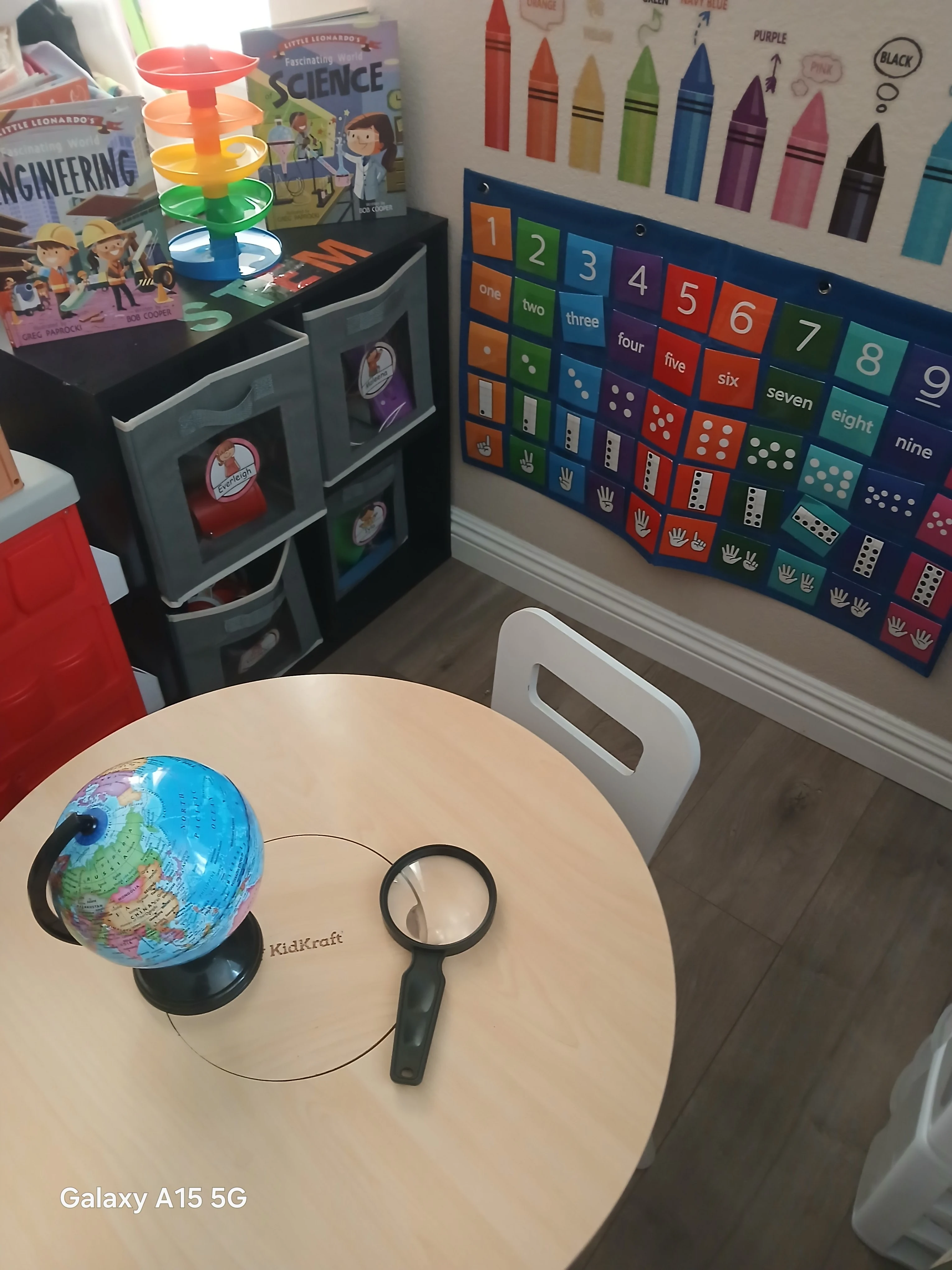STEM table with globe and learning tools